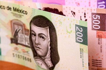 Mexican peso a business background.