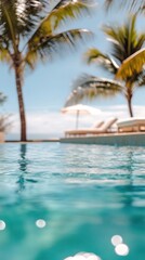 Tranquil poolside scene with palm trees and sun