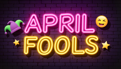 Obraz premium Bold and colorful April Fools’ Day neon sign banner against dark purple brick wall