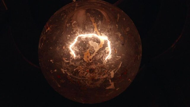 Dirty Lightbulb Turning On and Off