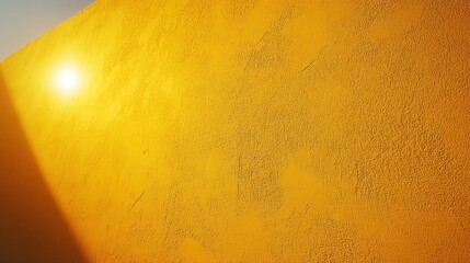Obraz premium Sunlit yellow wall, outdoor texture, shadow