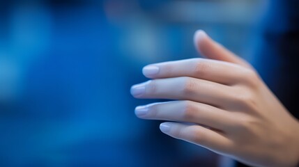 Female hand holding something for your design