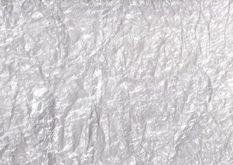 White crumpled plastic texture background. Rough surface backdrop.