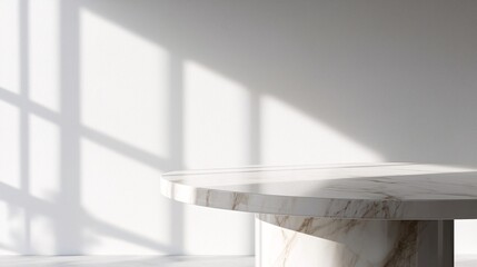 Obraz premium minimalist marble table with soft shadows in modern interior