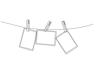 Continuous one line drawing of photo frame with clips. One line drawing illustration of photo frame hanging on the rope. National photography day concept single line. Editable outline