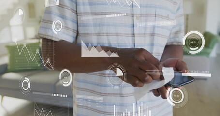 Image of data processing over african american man celaning his smartphone