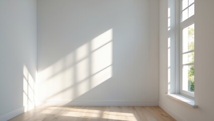Fototapeta premium empty interior room with large windows casting shadows on white walls and wooden floor in bright natural light