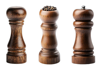 Elegant wooden pepper mills on a black background