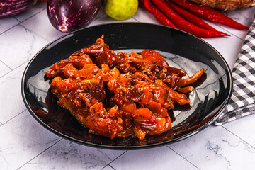 Asian cuisine - pork in chili sauce
