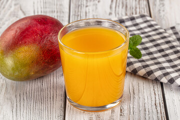 Sweet cold tropical mango juice