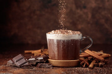Hot chocolate with whipped cream sprinkled with chocolate crumbs.