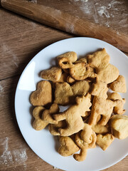 Fresh Baked Animal, Heart Cookies, biscuits on a plate, ready-made, homemade pastries. High quality photo