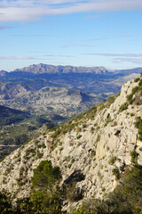 The mountain panorama opening from the hiking path to Puig Ca Campana, Finestrat, Spain  