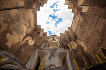 Wat Si Chum is an ancient religious site located outside the Sukhothai Historical Park, Sukhothai....