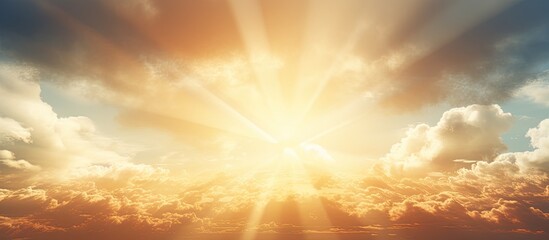 Obraz premium Vibrant stormy sky illuminated by radiant sunlight breaking through dynamic clouds showcasing various shades of orange and blue at the horizon