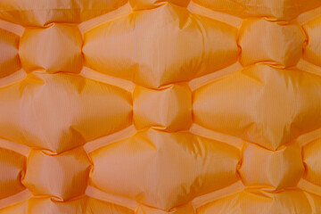 Colorful orange touristic outdoor mat as a texture