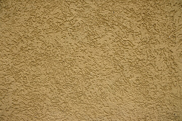 Yellow plastered wall as texture, background