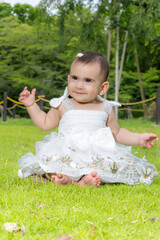 Sweetness Personified: A Charming Baby in the Park