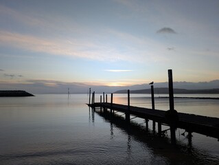An early morning pier sunrise 