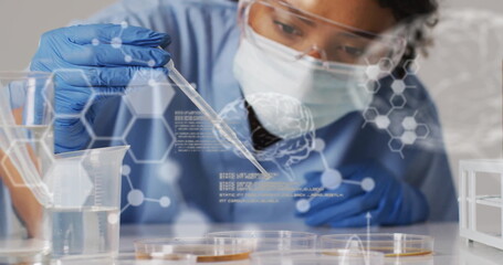 Image of science data processing over biracial female scientist doing experiment