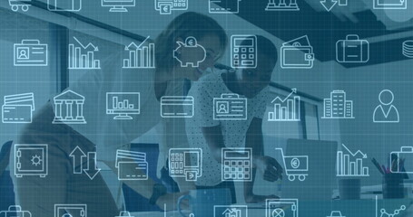 Business icons and data analytics image over diverse professionals collaborating in office