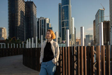 Woman in Modern Urban city, stylishly navigating the streets, surrounded by contemporary...
