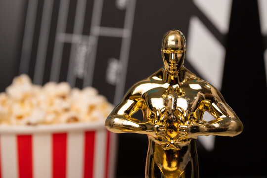 Oscar award, trophy statue with popcorn and a movie clapperboard, movie winner, statuette prize, cinema success,Moscow, Russia, January 21, 2025