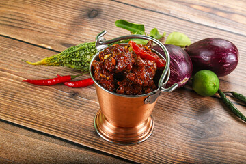 Asian cuisine - pork with chili sauce