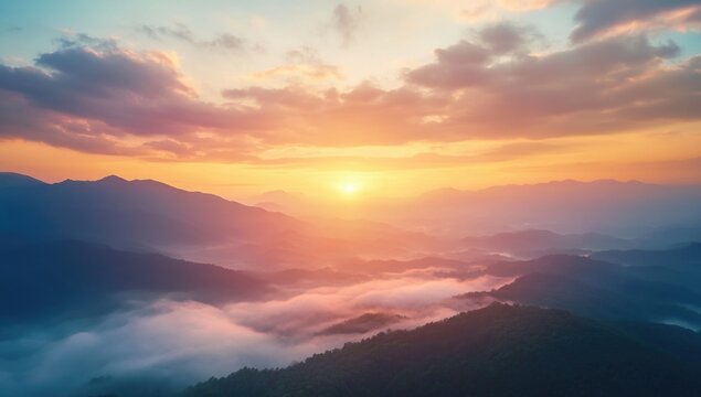 Beautiful mountain landscape with a dramatic sky at sunrise or sunset