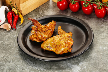 Tasty roasted chicken wing with spices