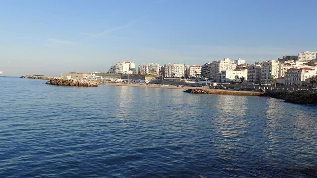 Alger the capital city of Algeria, North Africa, city centre of Algiers, the capital of Algeria, Landscape of Algiers city With port and mediterranean sea and white buildings, Arab Maghreb Africa.
