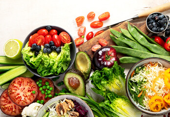 Table full with organic vegetables for making salad.