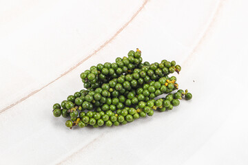 Green pepper corn on the branch