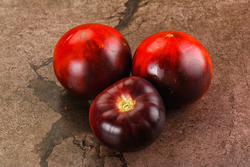 Black ripe juicy organic tomato