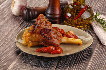 Baked lamb shank with vegetables