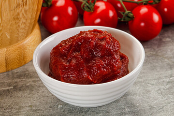 Red tomato paste in the bowl