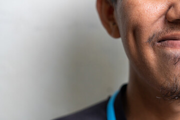 Close-Up of a Smiling Man's Face