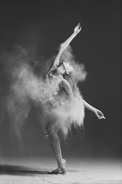 Dancing in flour dancer posing on a studio background