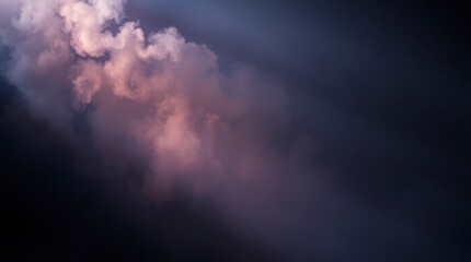 Obraz premium Dramatic purplish-pink smoke unfurls against a dark background, evoking a mystical atmosphere.