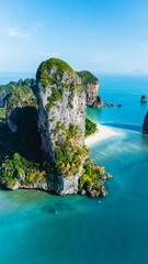 Mesmerizing cliffs and tranquil waters of Railay Beach invite adventure seekers in Krabi Thailand
