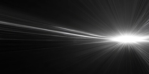 an abstract black and white image with a bright light source in the center emitting radiant beams of light