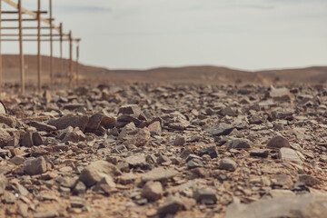 Rocky egyptian desert landscape with wooden structure in marsa alam