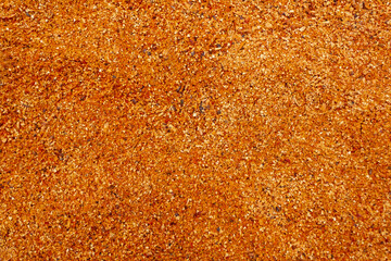 Full Frame Close-Up of Fine Orange Sawdust Wood Texture, Natural Rustic Background for Design and Craft Projects