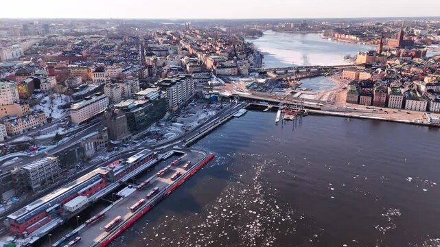 Stockholm, Sweden, construction of the new Slussen between S&ouml;dermalm and the old town. Winter, snow, ice, sunshine