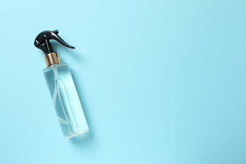 Natural cosmetic products. Cosmetic bottle on a blue background, top view