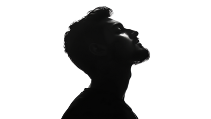 Thoughtful man gazing upward silhouette