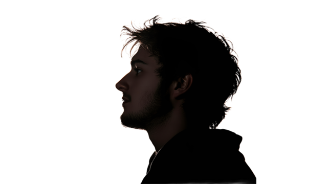 Silhouette of a young man with messy hair