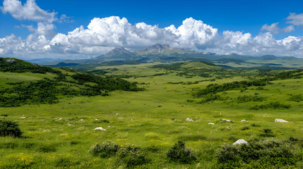Fototapeta premium Mountain vista, green valley, summer cloudscape, scenic landscape, travel photography