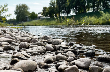 Rocky shoreline with a body of water in the background