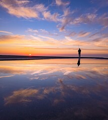 silhouette of a man on the beach